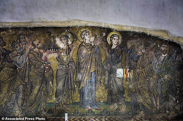 In this Feb. 4, 2016 photo, a mosaic is prepared for renovation inside inside the Church of the Nativity, in the West Bank city of Bethlehem. After two years of painstaking work, experts have completed the initial phase of a delicate restoration project at the Church of the Nativity, giving a much-needed face lift to one of Christianitys holiest sites. (AP Photo/Nasser Nasser)