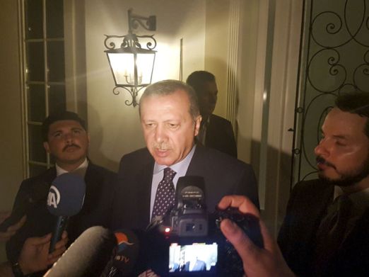Turkish President Tayyip Erdogan speaks to media in the resort town of Marmaris, Turkey, July 15, 2016. REUTERS/Kenan Gurbuz - RTSI7A7